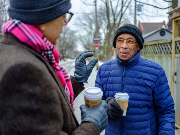istock Senior men out for a winter walk and coffee 1372380611