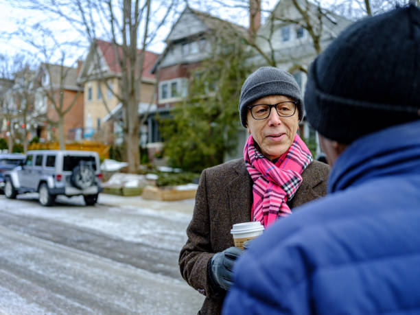 istock Senior men out for a winter walk and coffee 1372380612