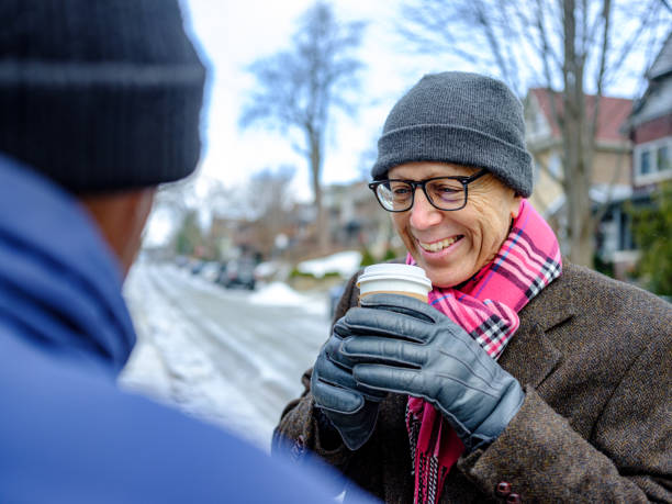 istock Senior men out for a winter walk and coffee 1372380637