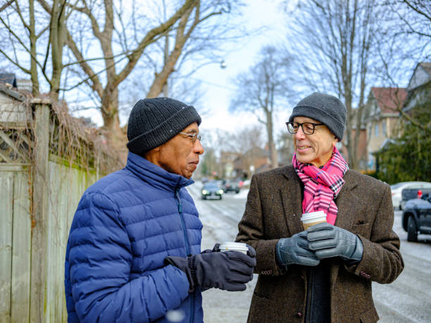 istock Senior men out for a winter walk and coffee 1372380646