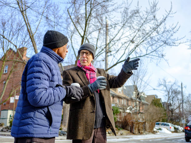 istock Senior men out for a winter walk and coffee 1372380677