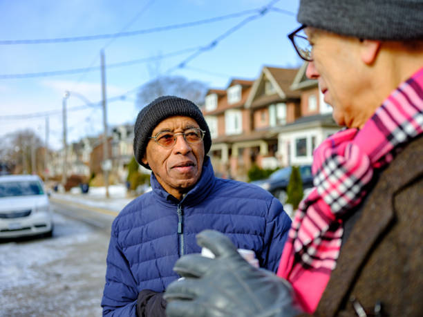 istock Senior men out for a winter walk and coffee 1372380681