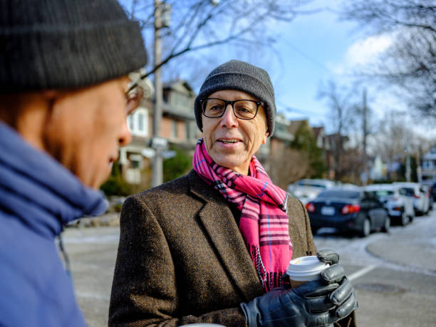 istock Senior men out for a winter walk and coffee 1372380788