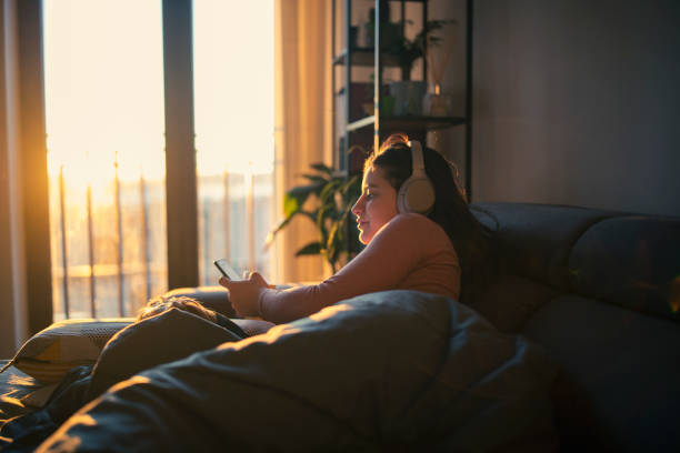 Woman using technology on a beautiful morning.