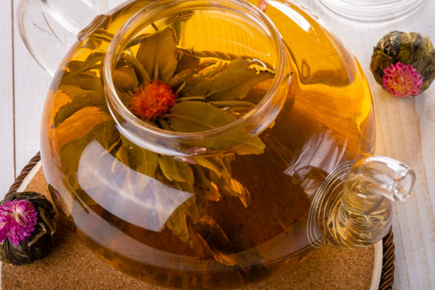 istock Green oolong tea bound in a flower 1372384903