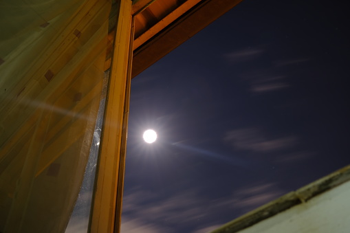 Long exposure and low angle moon photo