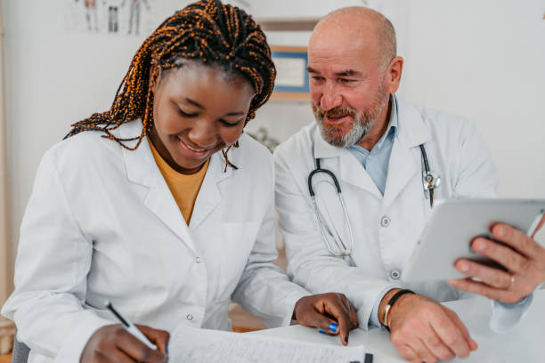 istock Two Doctors Consulting With Each Other 1372389220
