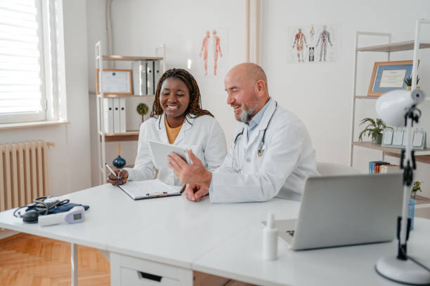 istock Two Doctors Consulting With Each Other 1372389308