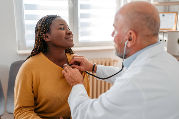 istock Doctor Auscultating A Patient 1372389446