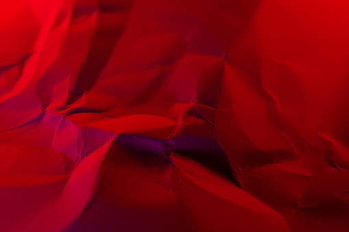 Vivid colored crumpled paper background.
