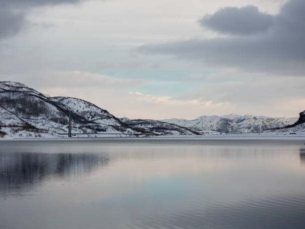 The Kafjord in Alta Municipality in Troms og Finnmark county, Norway, is crossed by a bridgeof the European route E06 highway follows the northern shoreline of the fjord.