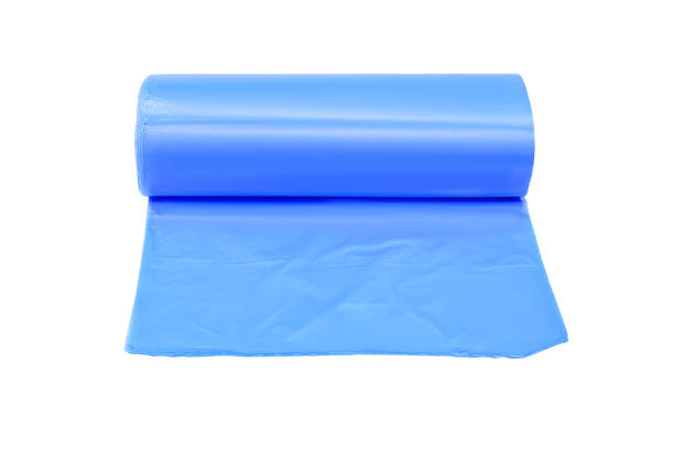 istock Roll of blue plastic garbage bags isolated on a white background 1372400807