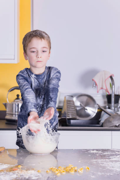 istock Little boy messing about 1372403042