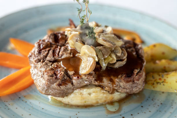 istock Sirlion steak with mushroom served with  mashed eggplant 1372403191