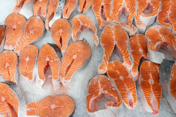istock chunks of red fish in ice close-up 1372409005