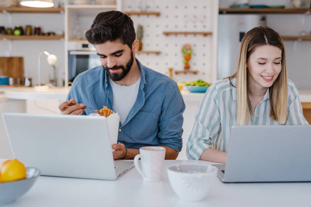 istock Young people working together from home 1372410619