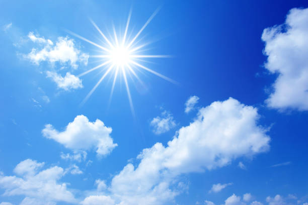 Sun on blue sky stock photo