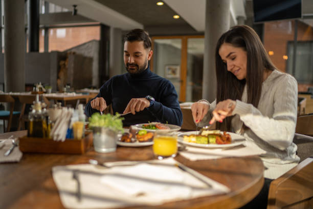 istock Couple eating in restaurant 1372422658