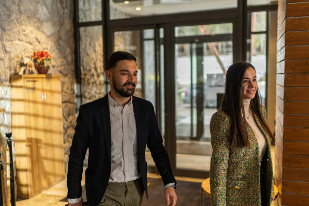 istock Couple arriving in hotel 1372422705