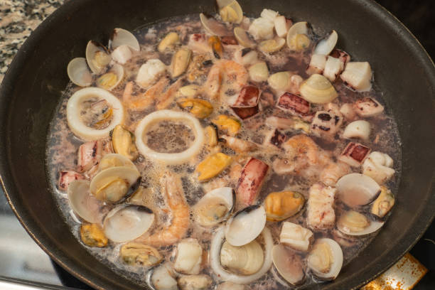 istock seafood fried in a pan at home 1372422894