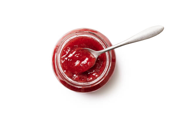 Strawberry jam glass jar stock photo