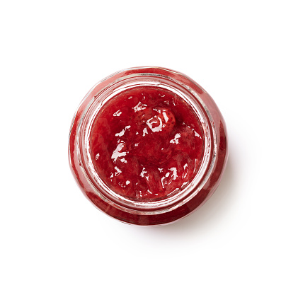 Strawberry jam glass jar with clipping path.