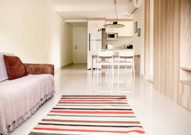 istock Comfortable lounge and kitchen of a small modern apartment 1372426451