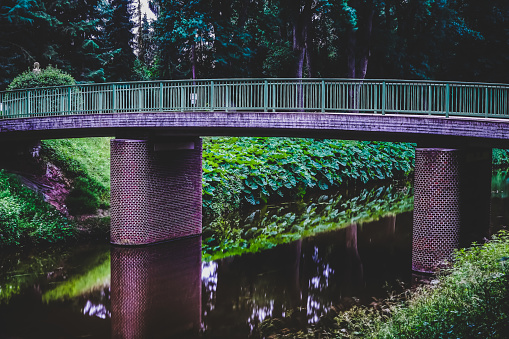 A bridge over a small river.