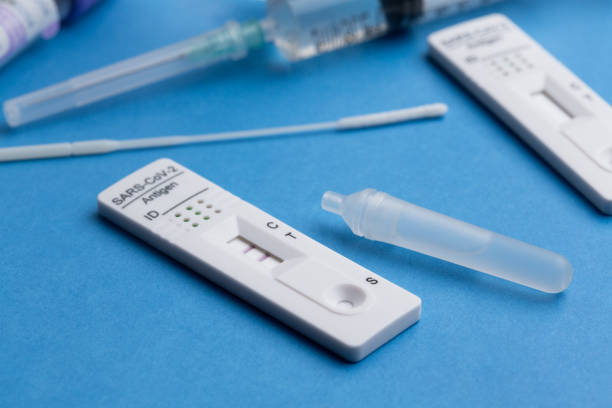 istock Positive test result by using rapid test device for COVID-19. 1372428779