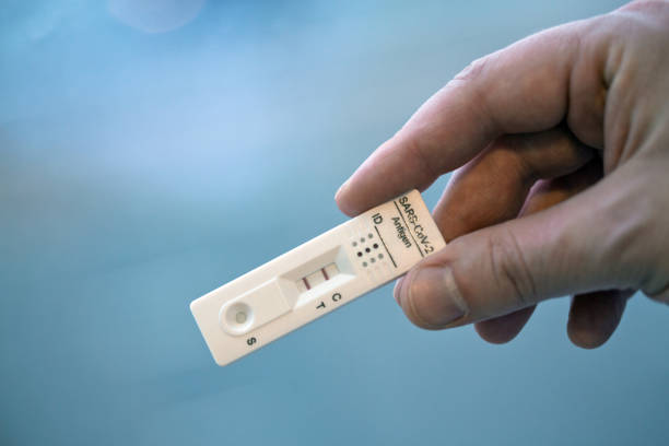 istock Positive test result by using rapid test device for COVID-19. 1372429298