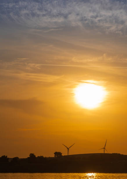 istock Wind turbines on the hillside under the sun 1372435315