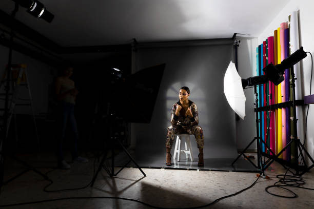 Photographic studio Photographic studio, arrangement of flashes, background and model. behind the scenes photos stock pictures, royalty-free photos & images
