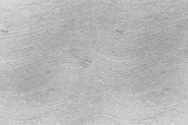 istock White and gray wall background. White painted cement wall texture. 1372440061