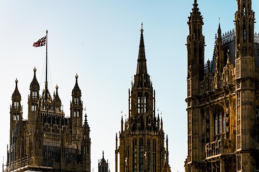 Detail of the stonework of the Victoria Tower above the Sovereigns Entrance to the Houses of Parliament in London, England