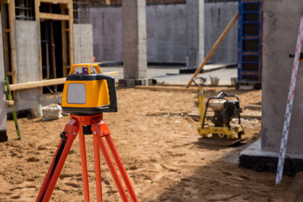 istock Theodolite at the construction site. construction measuring tool. Surveyor equipment at construction site. 1372441713