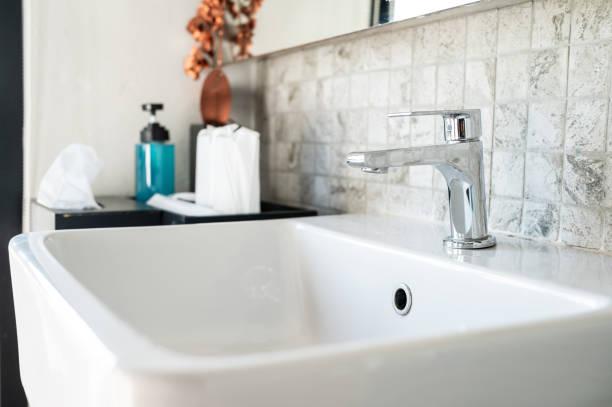 istock A Faucet with sink installation in bathroom. 1372441837