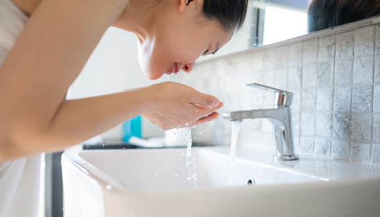 Wash your face once in the morning and once at night, as well as after sweating heavily.