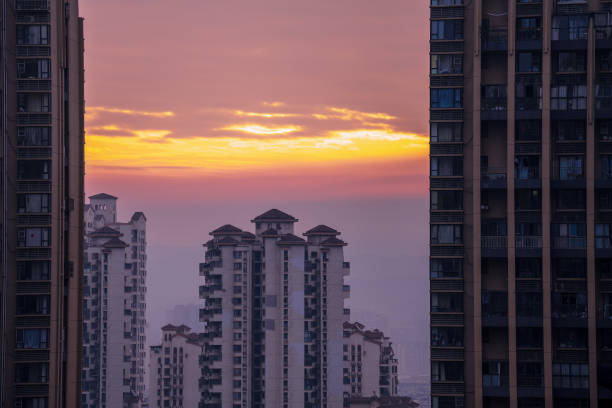 istock Burning modern urban buildings under clouds 1372446285