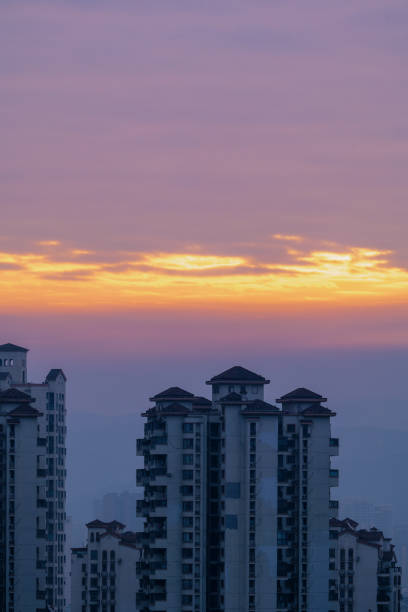 istock Burning modern urban buildings under clouds 1372446312