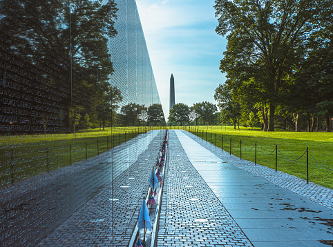 The Vietnam War Memorial and Washington Monument in Washington DC.