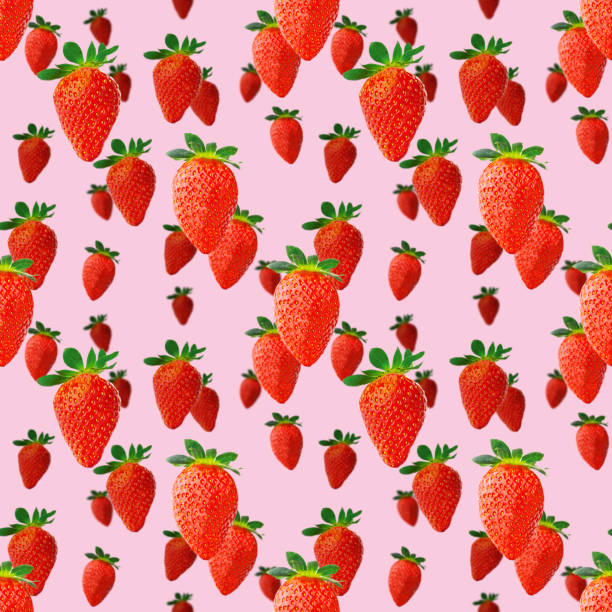 istock Strawberry seamless pattern. Ripe strawberries isolated on pink. package design background. 1372451092