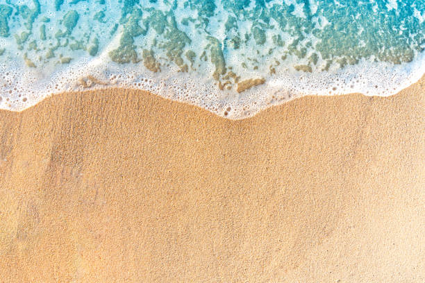istock Beach Sand Sea Shore with Blue wave. Aerial beach top view overhead seaside. 1372454702