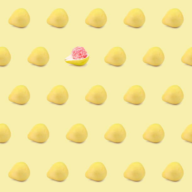istock Seamless pattern made up of pomelo fruit laid on its side and one half-peeled fruit 1372462307