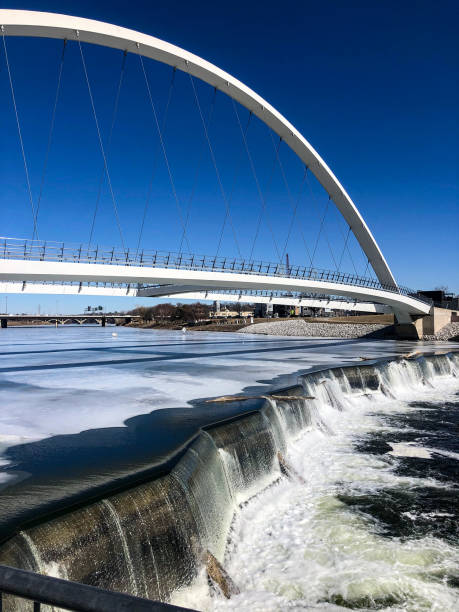 istock Single arch pedestrian bridge in Iowa 1372463494