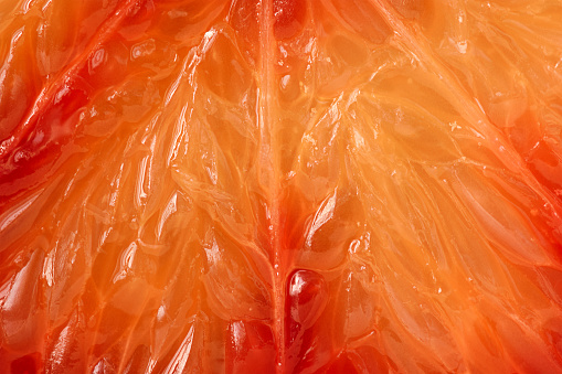 Macro view of a cross section slice of blood orange. Fifth photo in the set