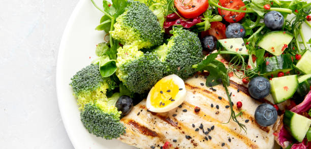 Ketogenic diet meals assortment on light background.