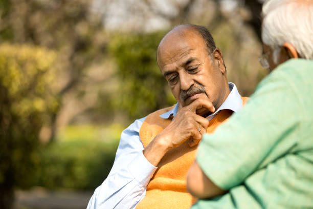 istock Thoughtful senior men at park 1372469182