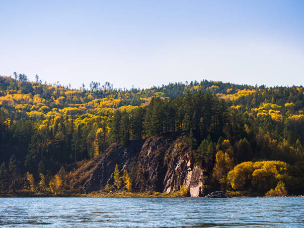 istock Rocky river bank on a summer autumn day 1372471120