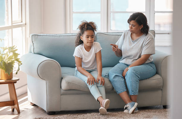 Shot of a young mother scolding her daughter I'm not going to say it again scolding stock pictures, royalty-free photos & images