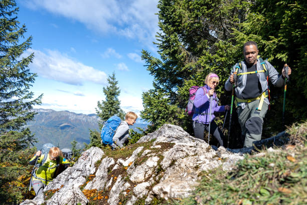 istock Group of hikers climbing on mountain 1372478632